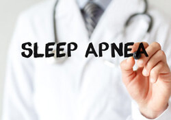 a person writing the term sleep apnea