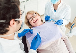 Woman smiling in the dental chair