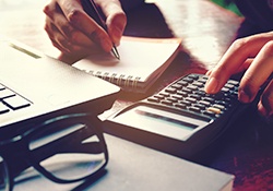 Woman using a calculator